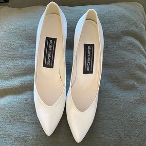Leather ivory Stuart Weitzman pumps. Size 6 1/2 narrow. Never worn.